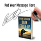 Book titled 'Dark Cover-Up' by Evan Graver with a hand holding a pen and signature on a white background.