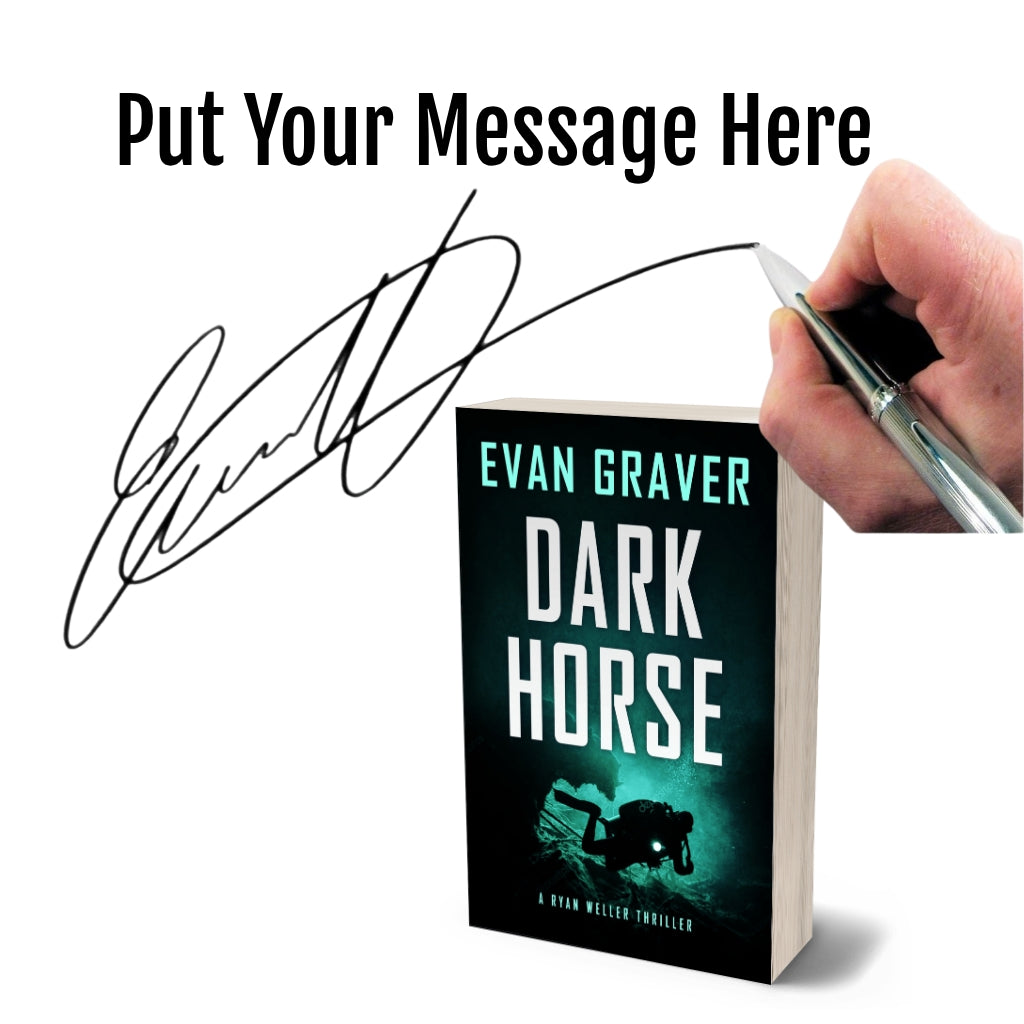 Book titled 'Dark Horse' by Evan Graver with a hand holding a pen and signature on a white background
