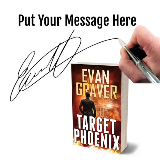 Book titled 'Target Phoenix' by Evan Graver with a hand signing it on a white background.