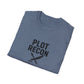 Folded blue t-shirt with 'Plot Recon' text and sword graphic on a white background