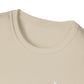 Close-up of a beige t-shirt with a plain background