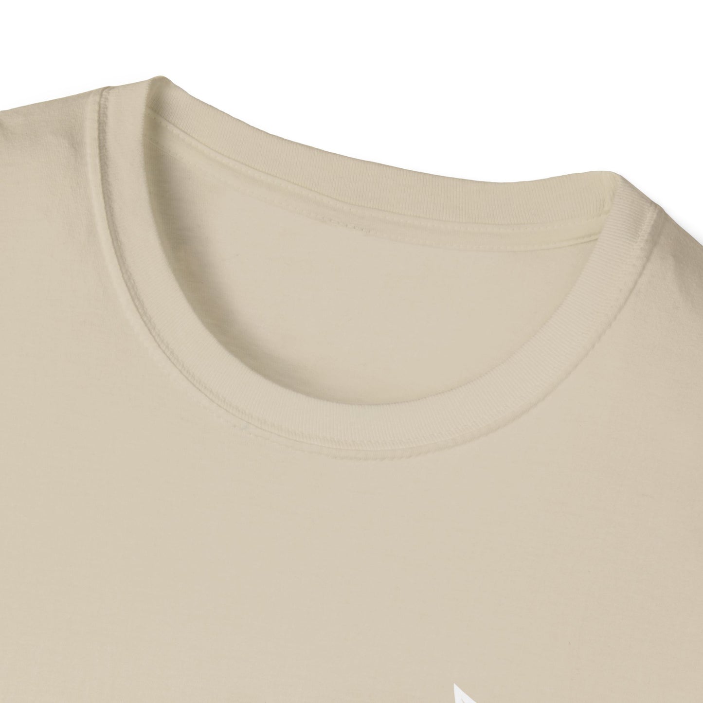 Close-up of a beige t-shirt with a plain background