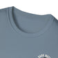 Close-up of a light blue t-shirt with 'Dark Water' logo.