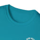Close-up of a teal t-shirt with 'Dark Water' text on a white background